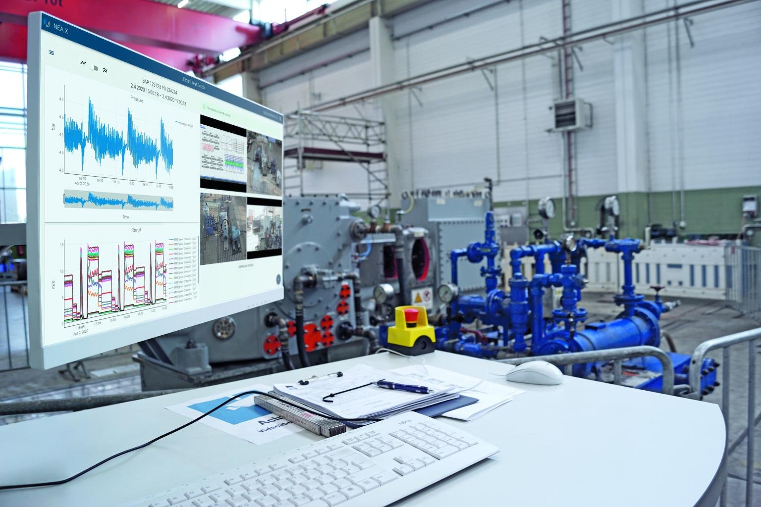 XPLORE monitoring dashboard displayed on screen in an industrial compressor facility